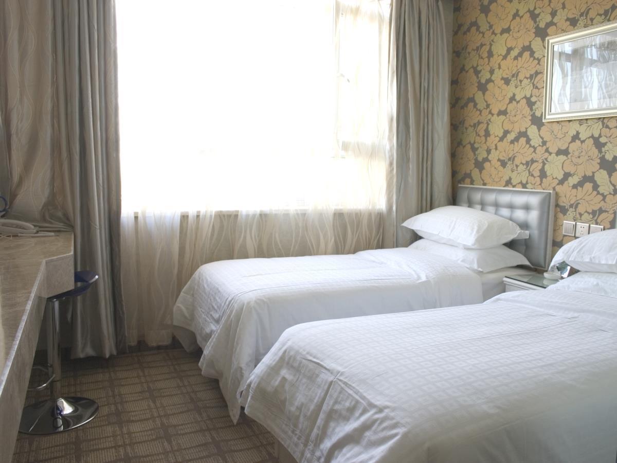 Xinyijia City Hotel Урумчи Экстерьер фото