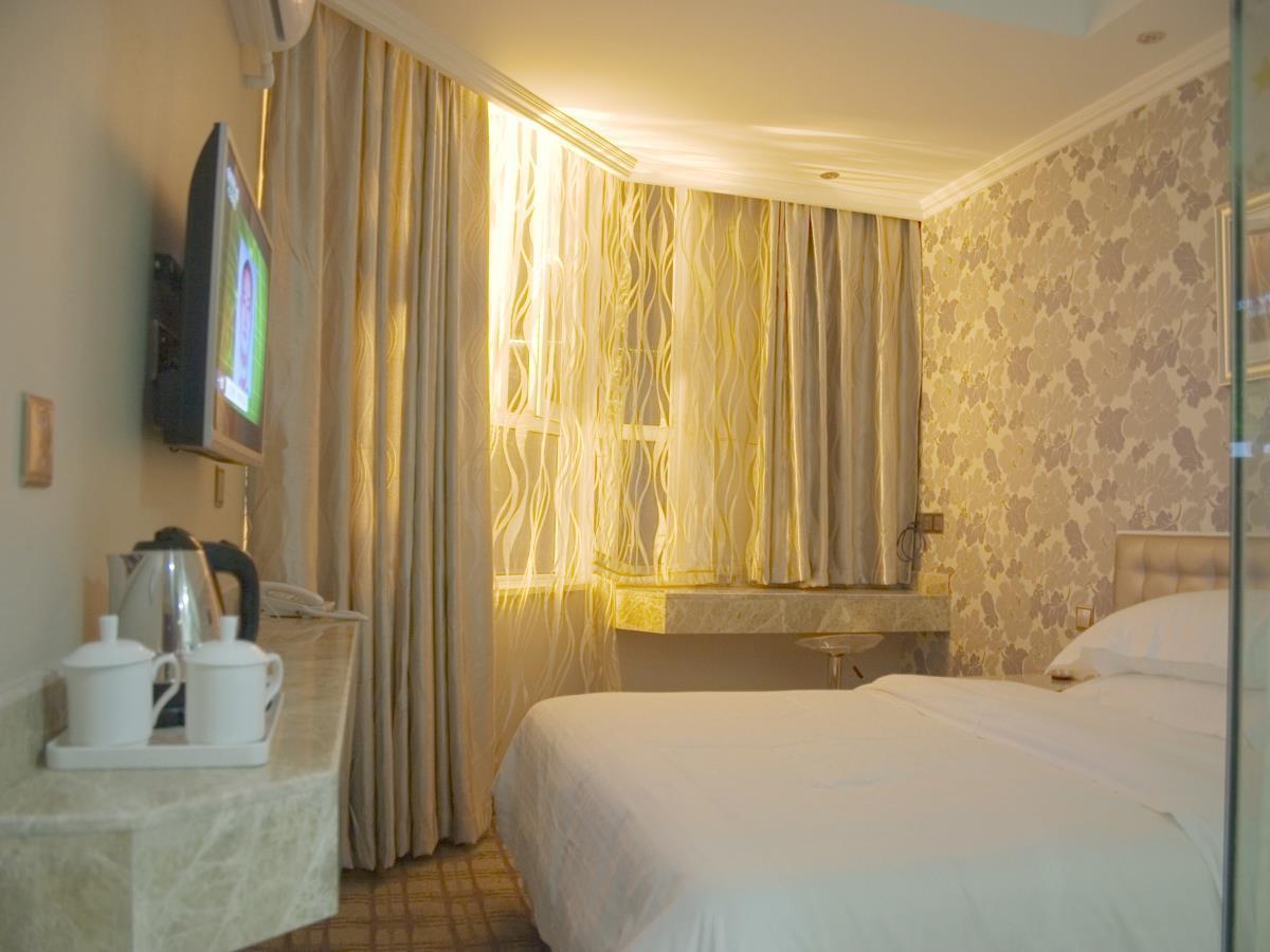 Xinyijia City Hotel Урумчи Экстерьер фото