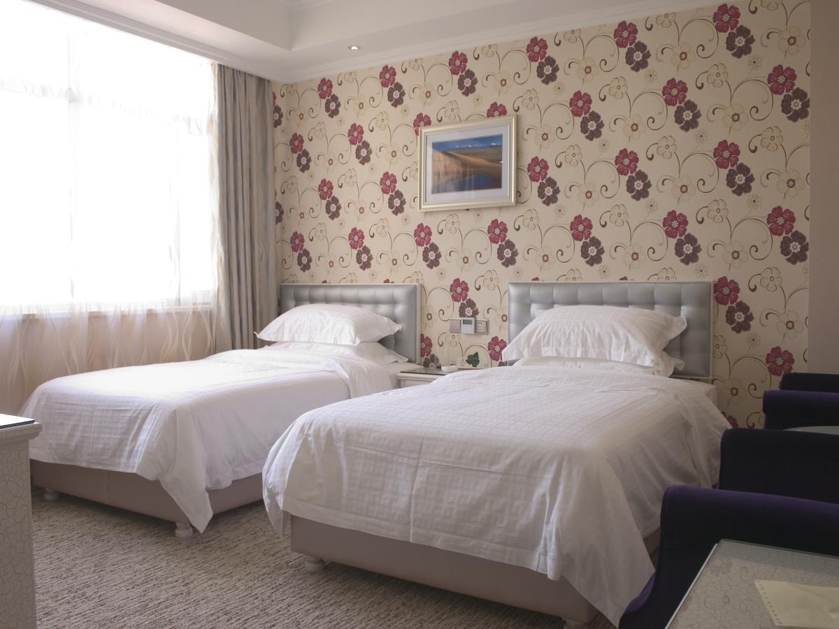 Xinyijia City Hotel Урумчи Экстерьер фото